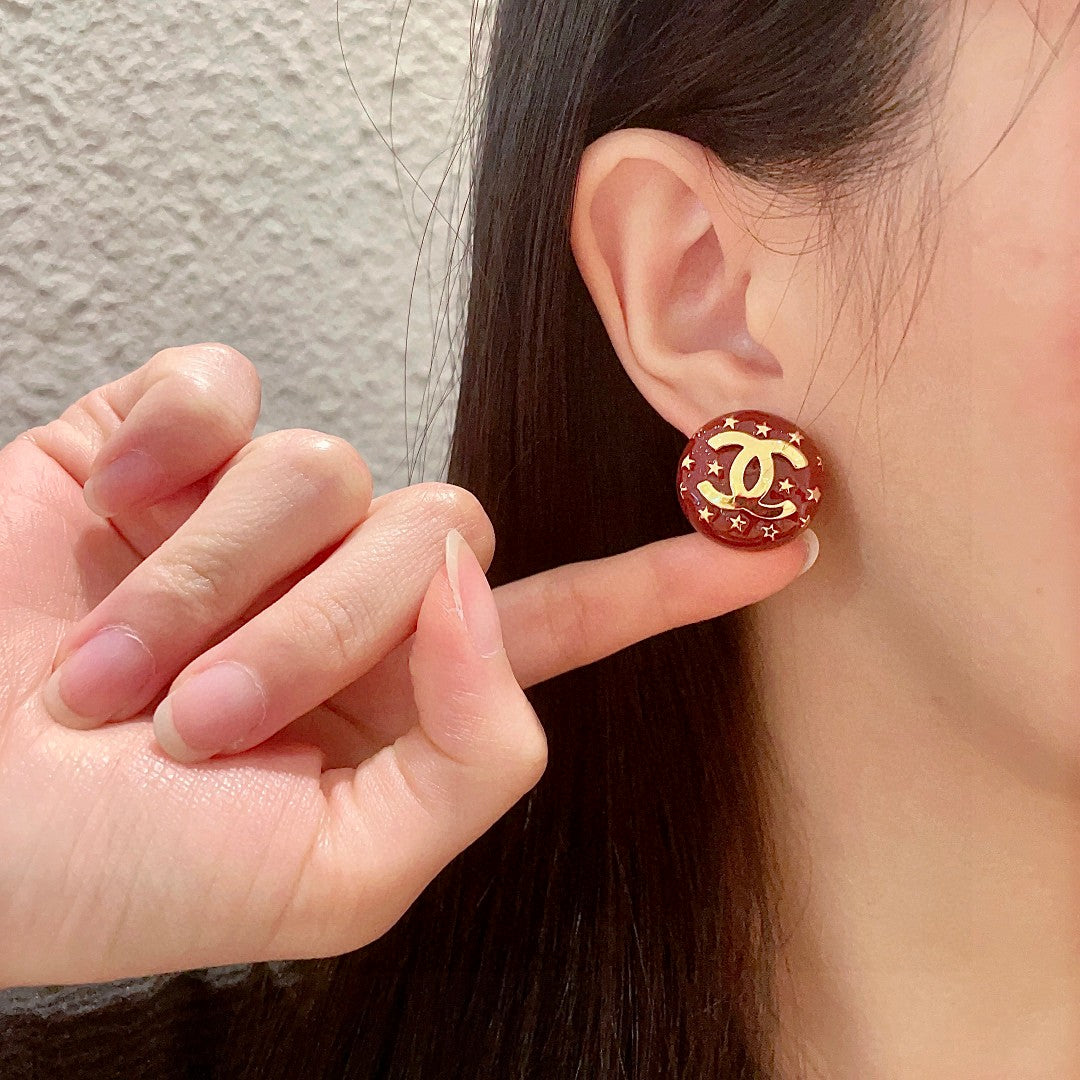 Double-C Emblem Stud Earrings in Polished Metal-Tone – Star Detail – Design 011 front product view