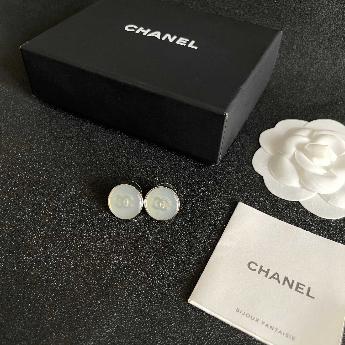 Double-C Emblem Stud Earrings in Polished Metal-Tone – Design 231 close-up detail
