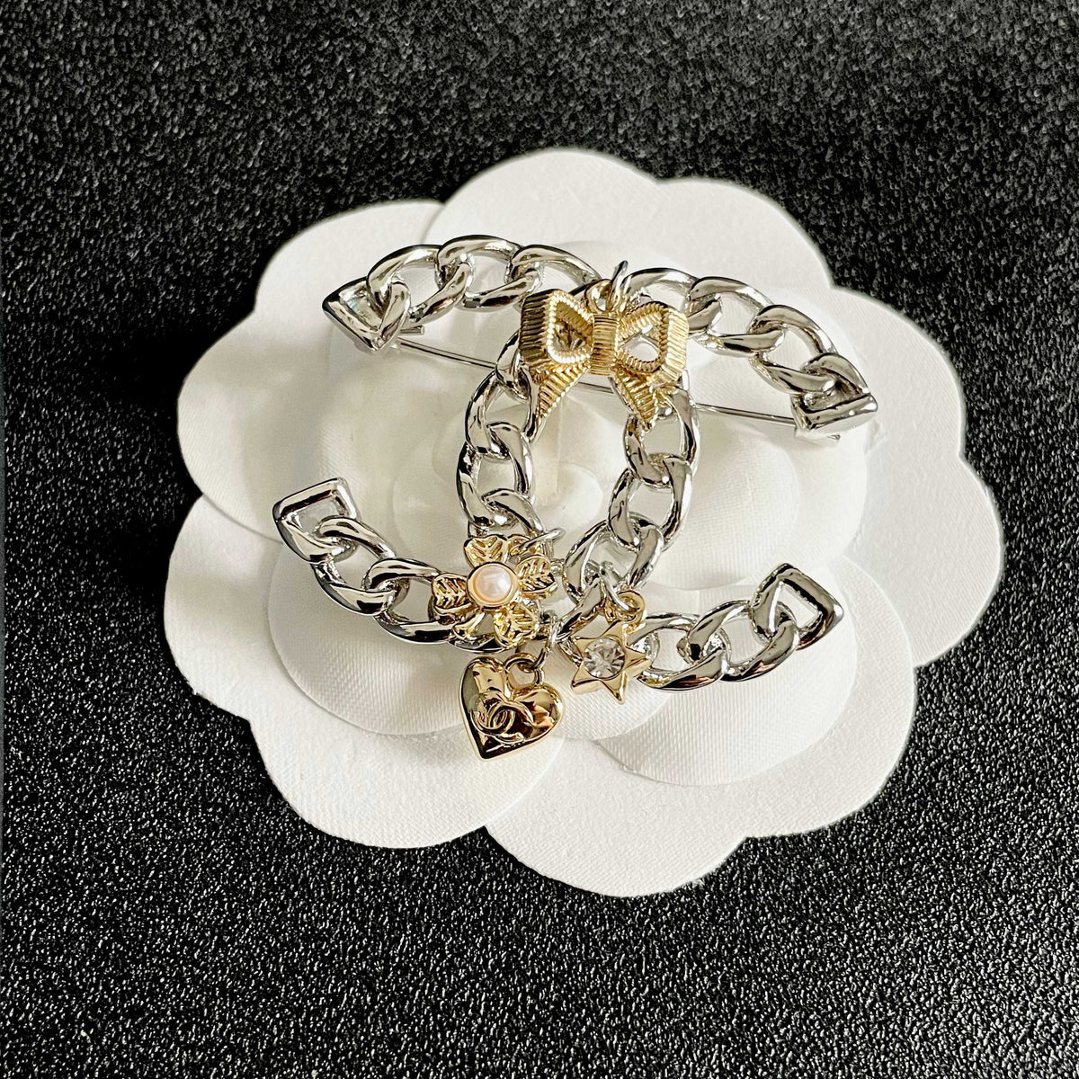 Signature Emblem Brooch in Polished Metal-Tone – Design 029 front product view