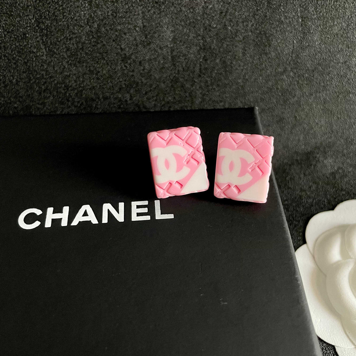Double-C Emblem Stud Earrings in Polished Metal-Tone – Design 260 detail view