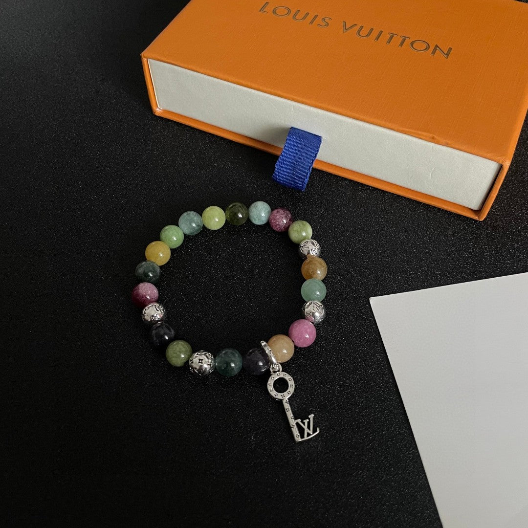 Letter Emblem Bracelet in Polished Metal-Tone – Pearl Detail – Design 003 close-up detail