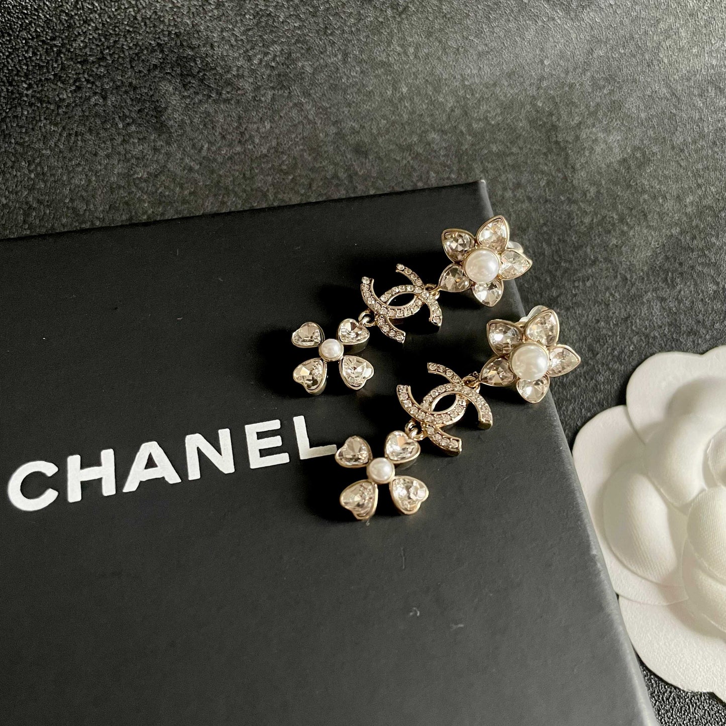 Signature Emblem Stud Earrings in Polished Metal-Tone – Design 047 detail view