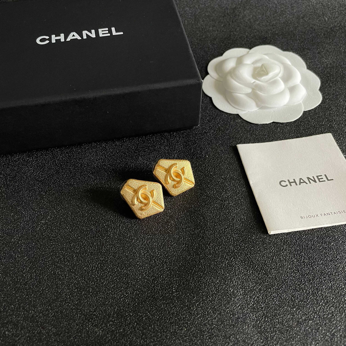 Double-C Emblem Stud Earrings in Polished Metal-Tone – Design 289 styled product view