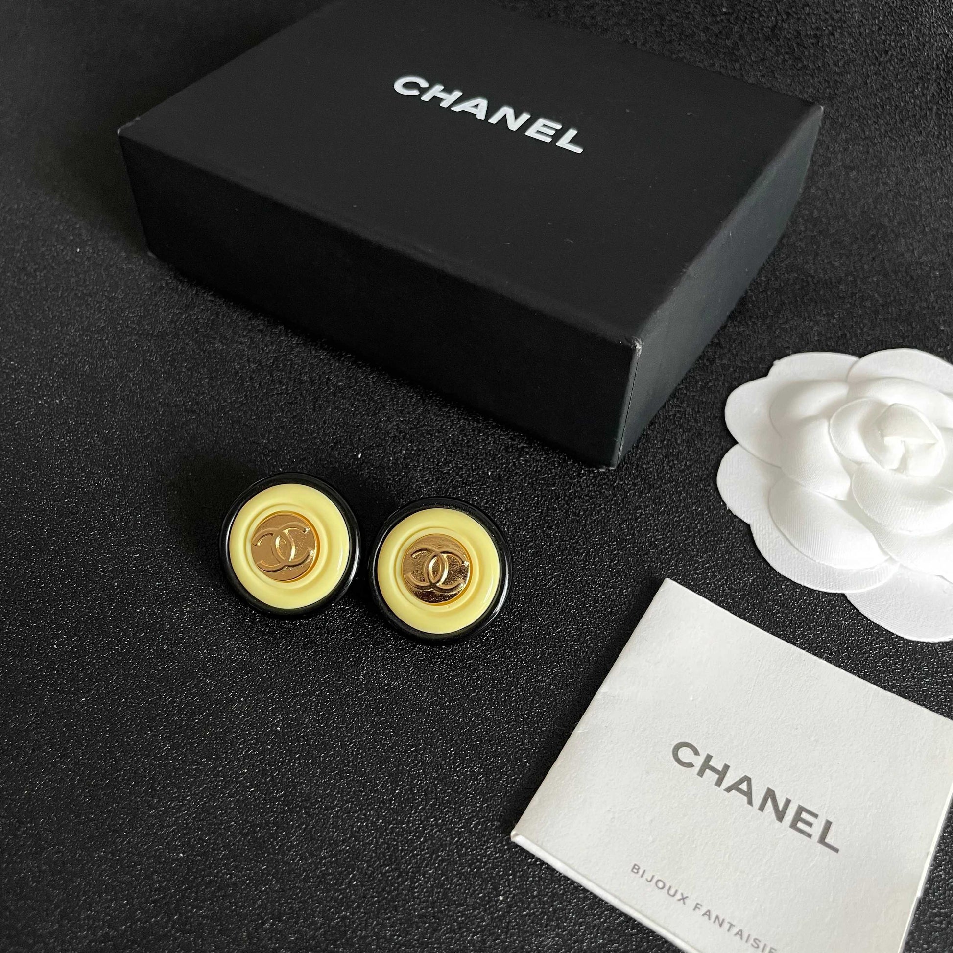 Double-C Emblem Stud Earrings in Polished Metal-Tone – Design 332 close-up detail