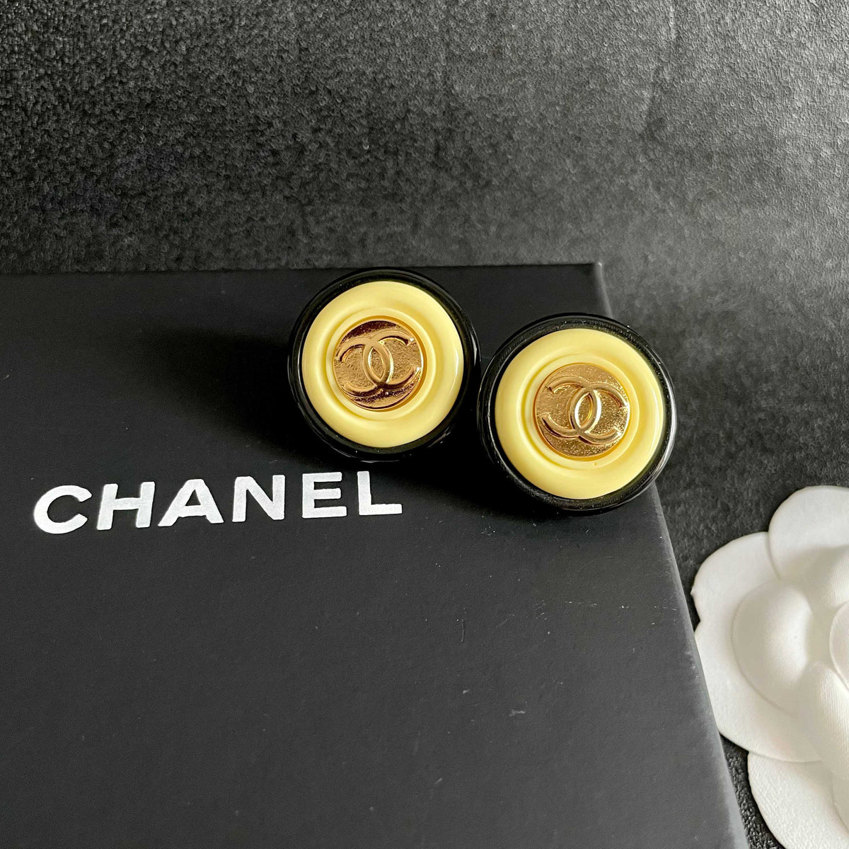 Double-C Emblem Stud Earrings in Polished Metal-Tone – Design 310 detail view