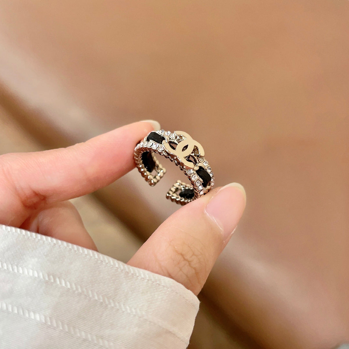 Double-C Emblem Statement Ring in Polished Metal-Tone – White Detail – Design 003 side detail