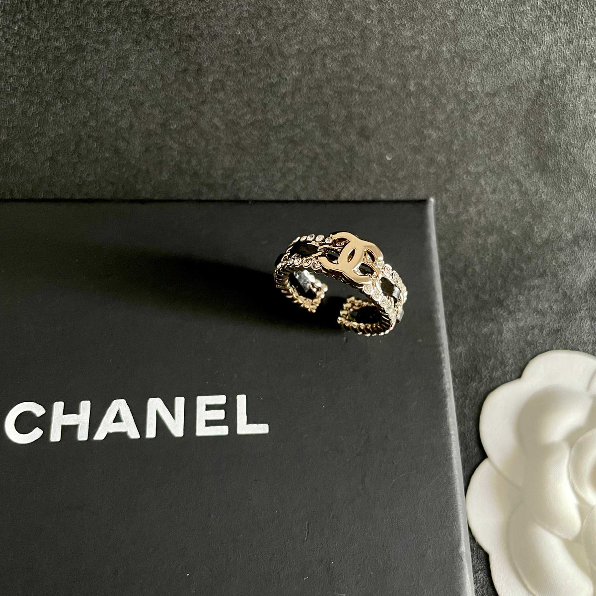 Double-C Emblem Statement Ring in Polished Metal-Tone – White Detail – Design 003 detail view