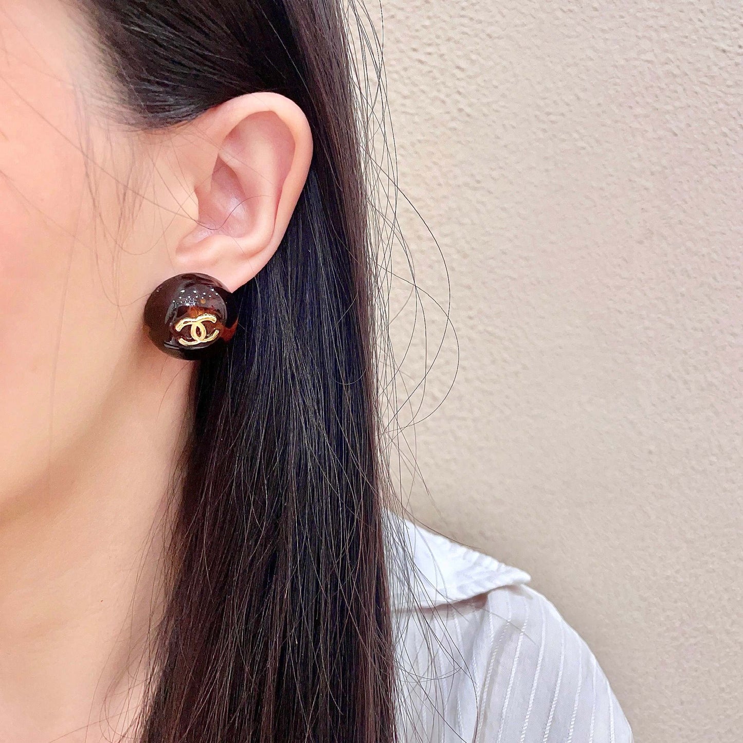 Signature Emblem Stud Earrings in Polished Metal-Tone – Design 069 detail view
