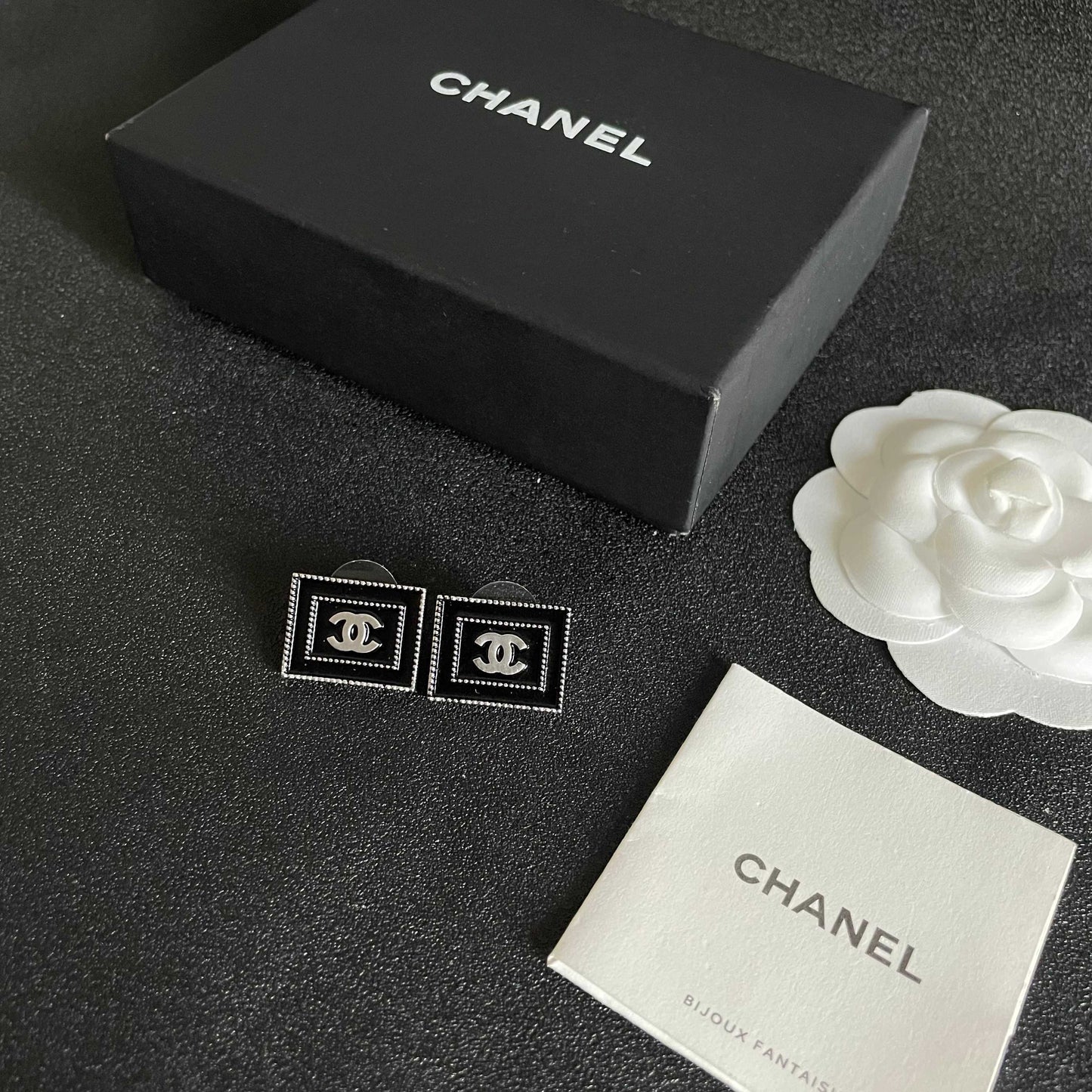 Double-C Emblem Stud Earrings in Polished Metal-Tone – Design 169 close-up detail