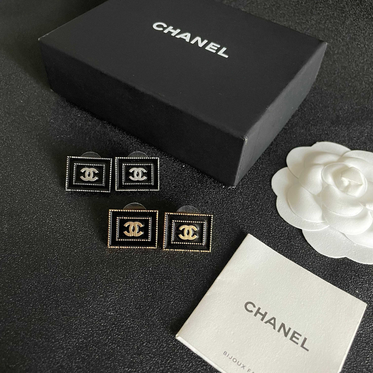 Double-C Emblem Stud Earrings in Polished Metal-Tone – Design 168 close-up detail