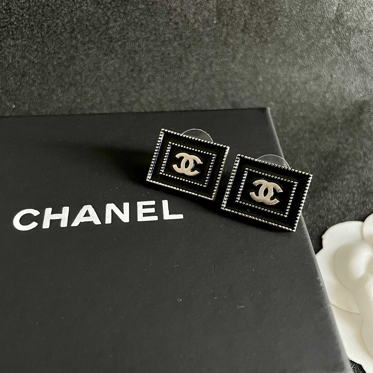 Double-C Emblem Stud Earrings in Polished Metal-Tone – Design 169 detail view