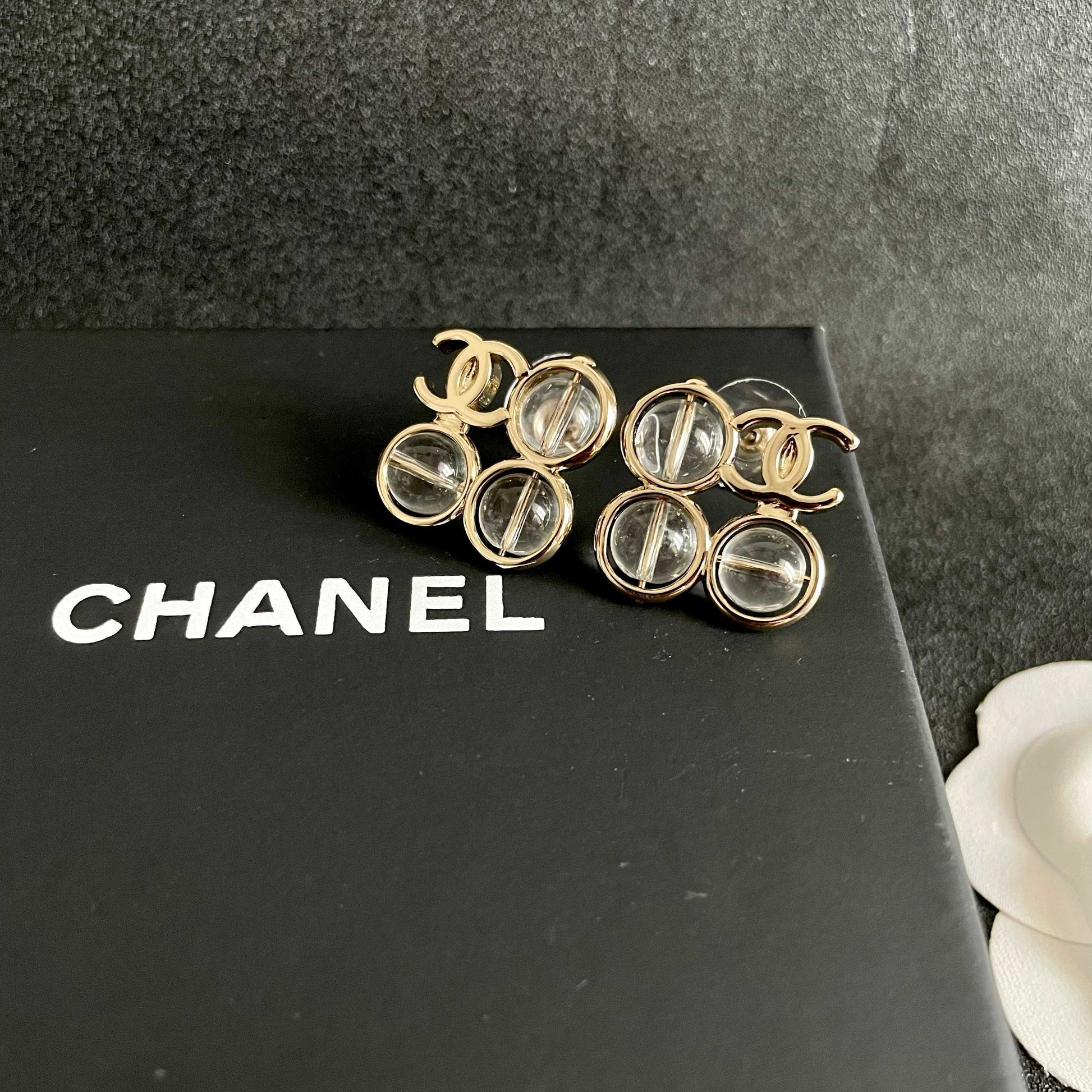 Double-C Emblem Stud Earrings in Polished Metal-Tone – Design 373 detail view