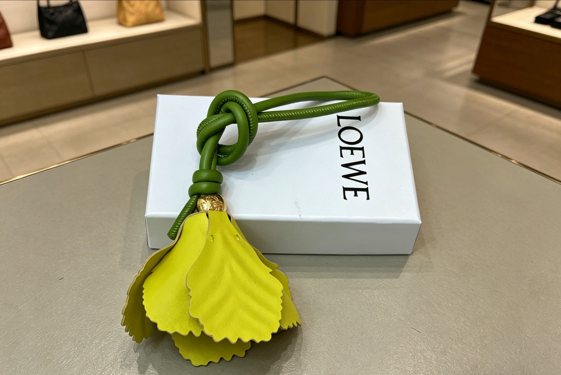 Sculptural Bag Charm in Gold-Tone with Leather Detail – Design 02 front view