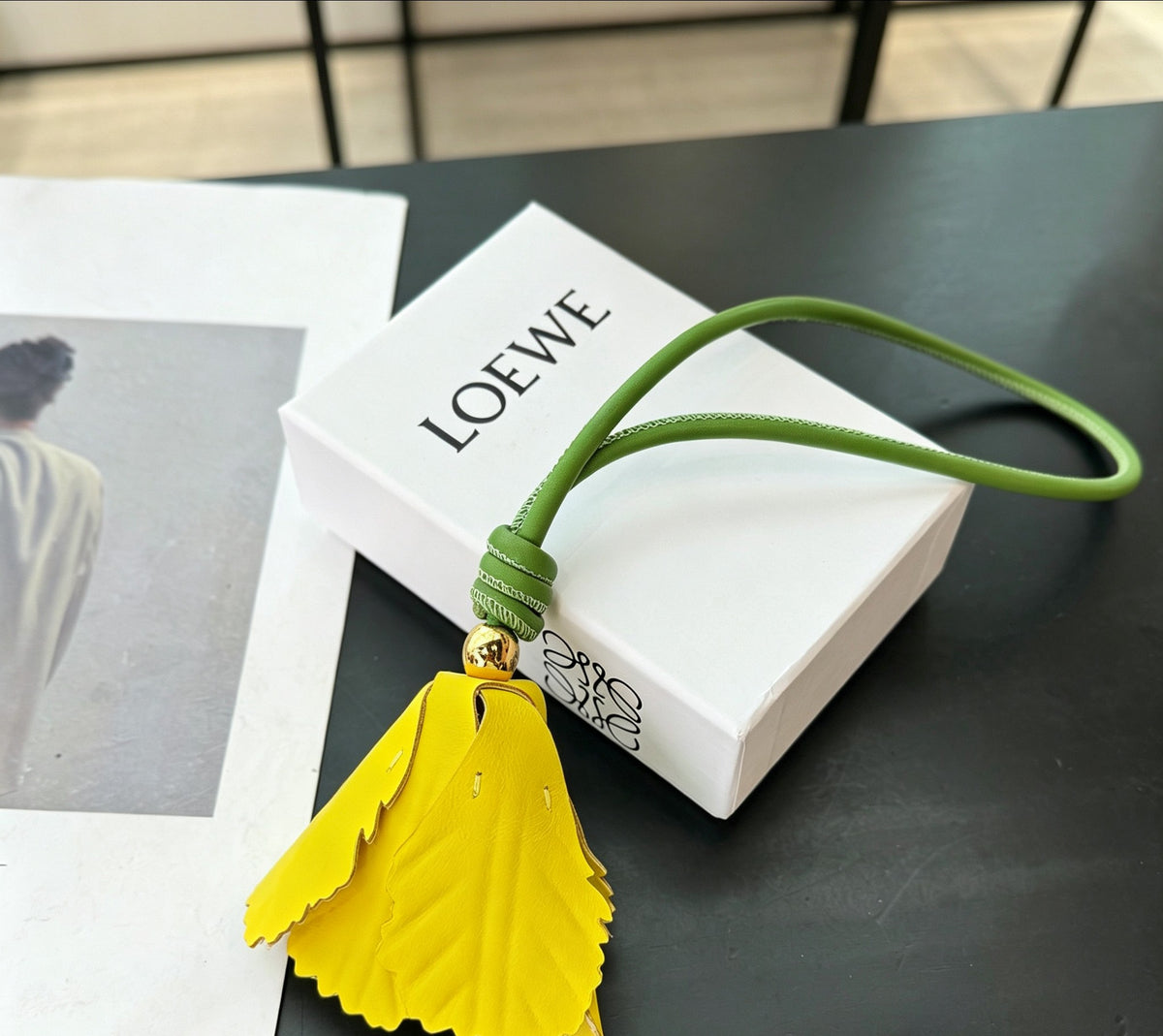 Sculptural Bag Charm in Gold-Tone with Leather Detail – Design 02 styled view