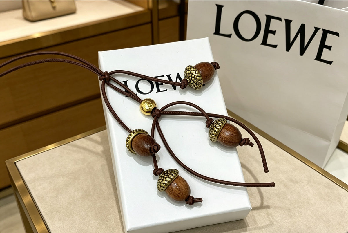 Star Motif Jewelry Accessory in Polished Metal-Tone front view