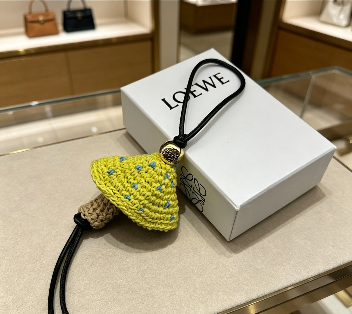 Sculptural Bag Charm in Gold-Tone with Leather Detail – Design 01 side detail