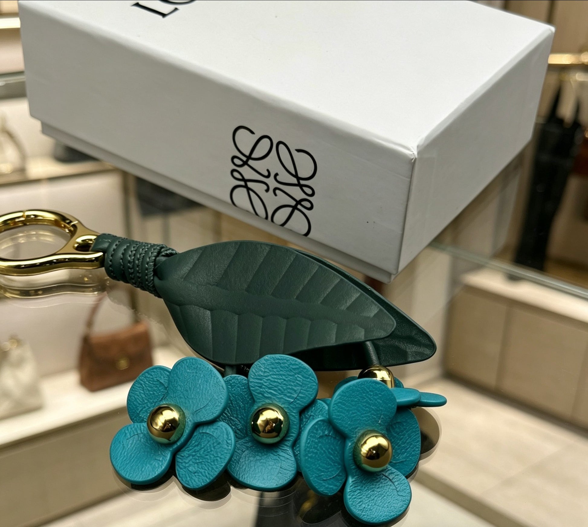 Floral Motif Bag Charm in Polished Metal-Tone with Leather Detail – Design 02 side detail