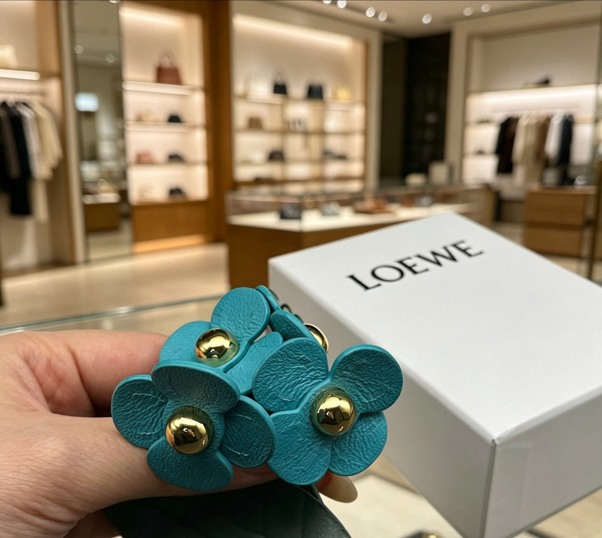 Floral Motif Bag Charm in Polished Metal-Tone with Leather Detail – Design 02 close-up detail