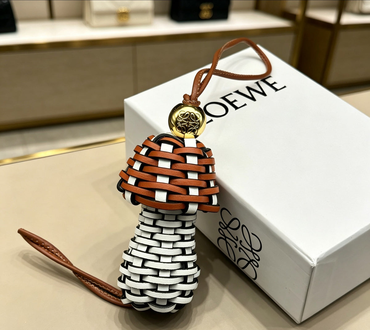 Graphic Emblem Bag Charm in Polished Metal-Tone with Leather Detail – Design 01 main product view