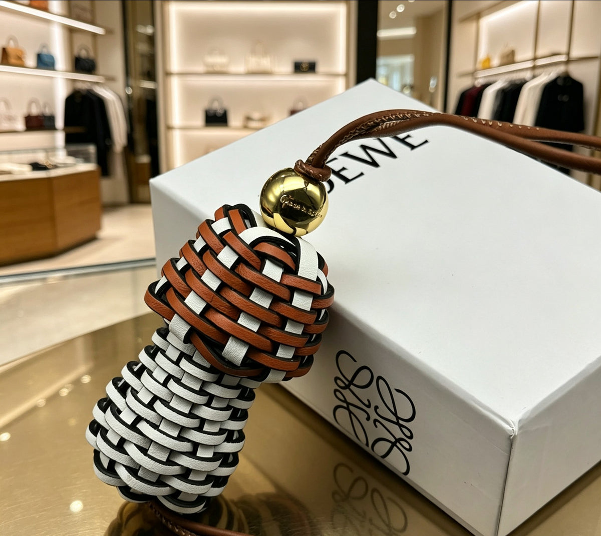 Graphic Emblem Bag Charm in Polished Metal-Tone with Leather Detail – Design 01 side detail
