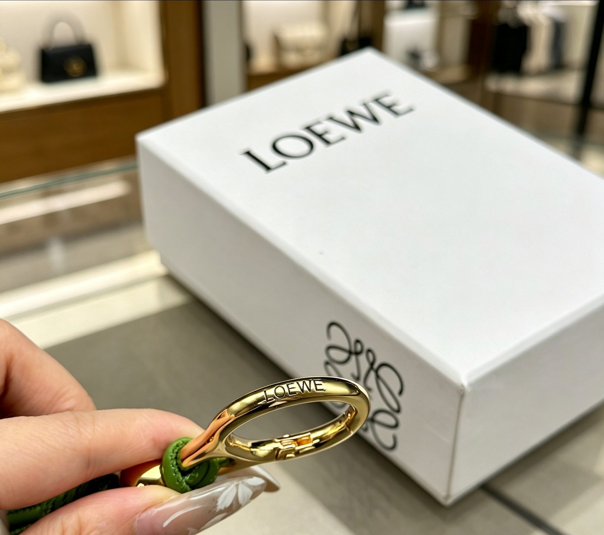Floral Motif Bag Charm in Polished Metal-Tone with Leather Detail – Design 01 close-up detail