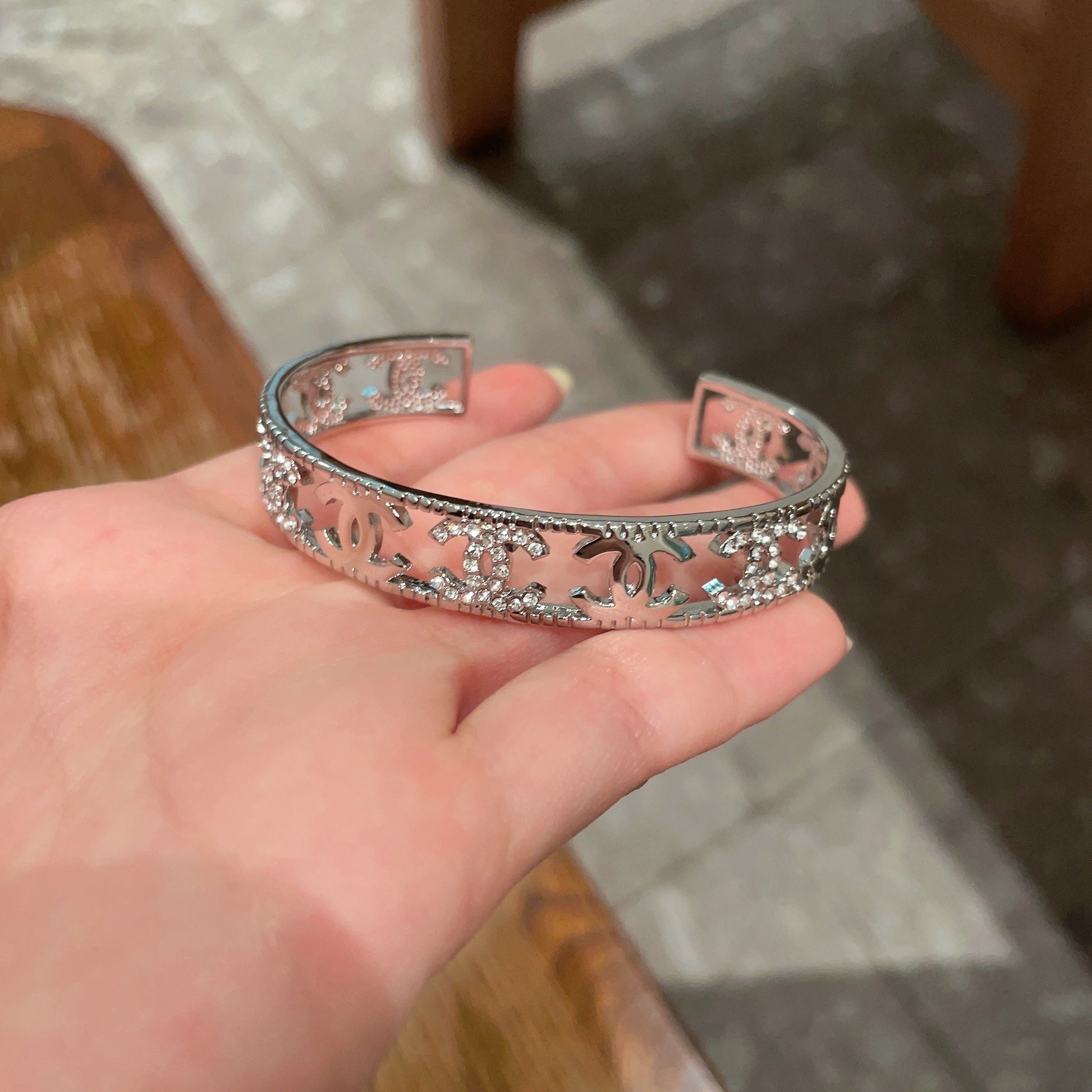 Letter Bangle in Polished Metal-Tone – Red Detail detail view