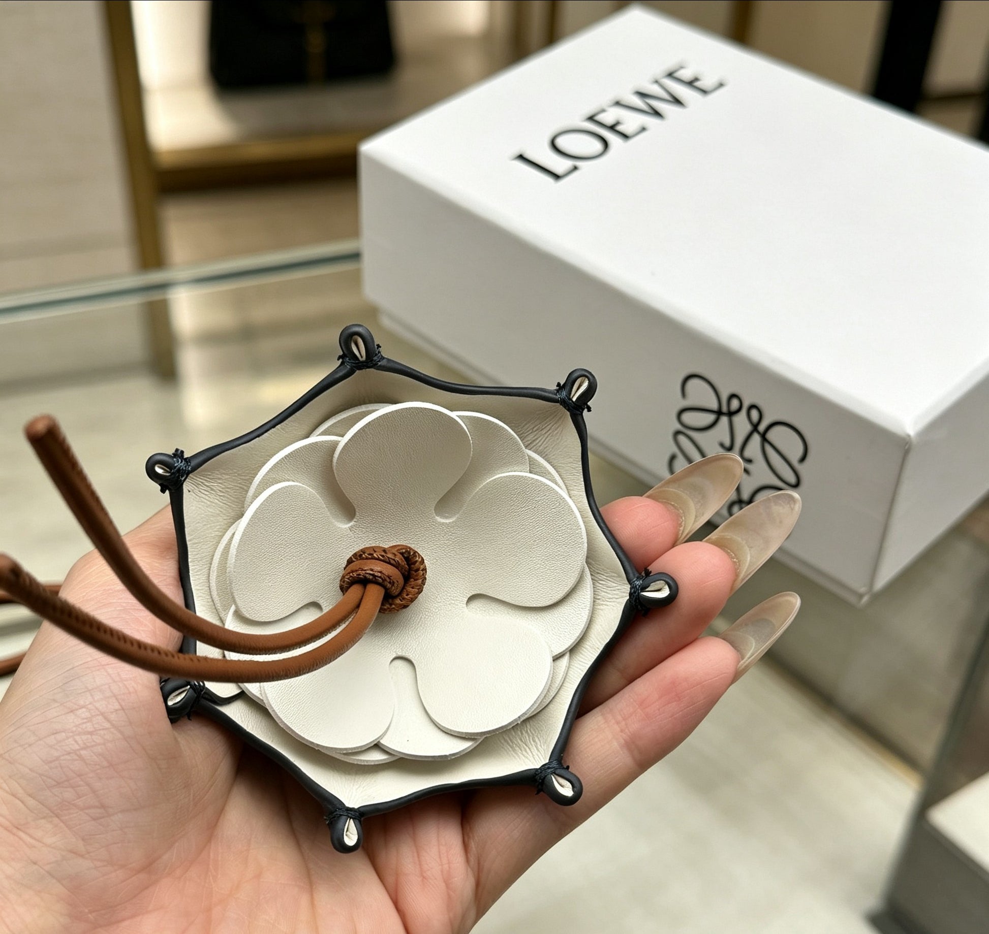 Floral Motif Bag Charm in Polished Metal-Tone with Leather Detail – Design 03 close-up detail
