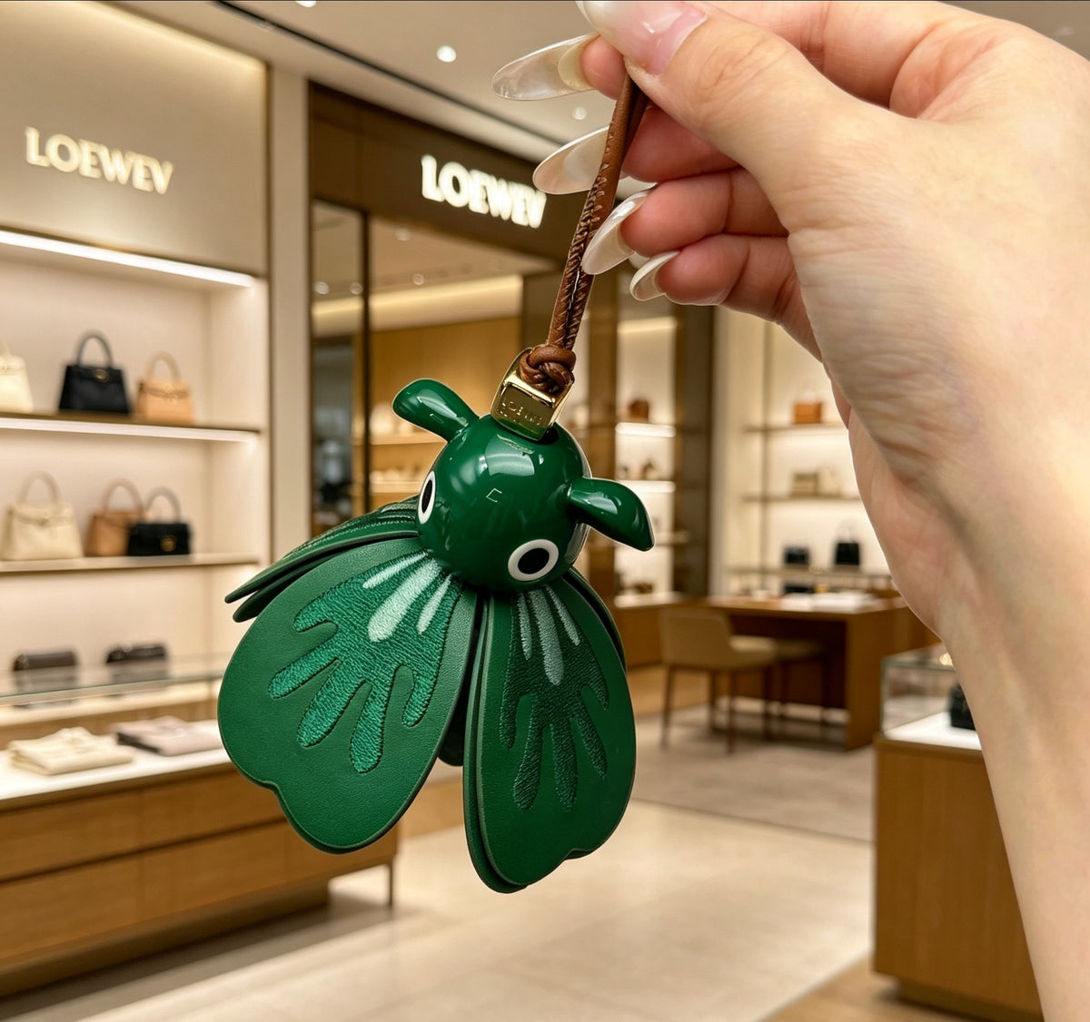Elephant Motif Bag Charm in Polished Metal-Tone with Leather Detail – Design 04 front view