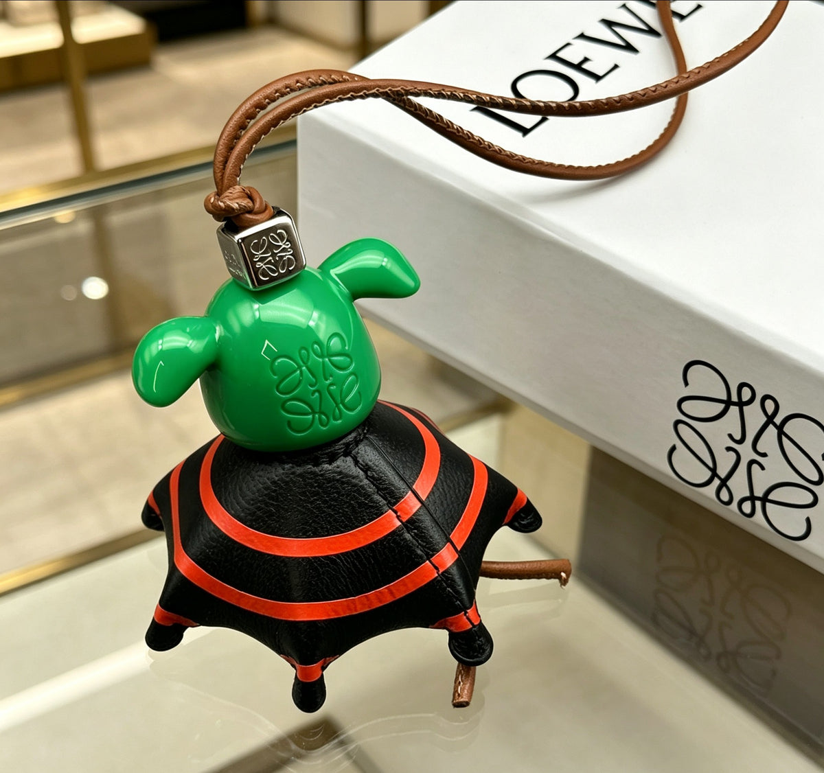 Elephant Motif Bag Charm in Polished Metal-Tone with Leather Detail – Design 01 side detail