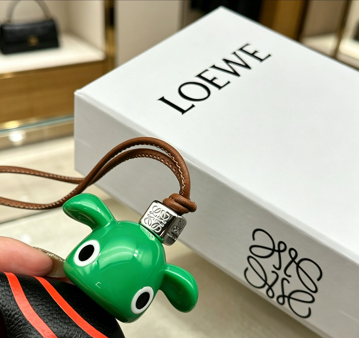 Elephant Motif Bag Charm in Polished Metal-Tone with Leather Detail – Design 01 styled view