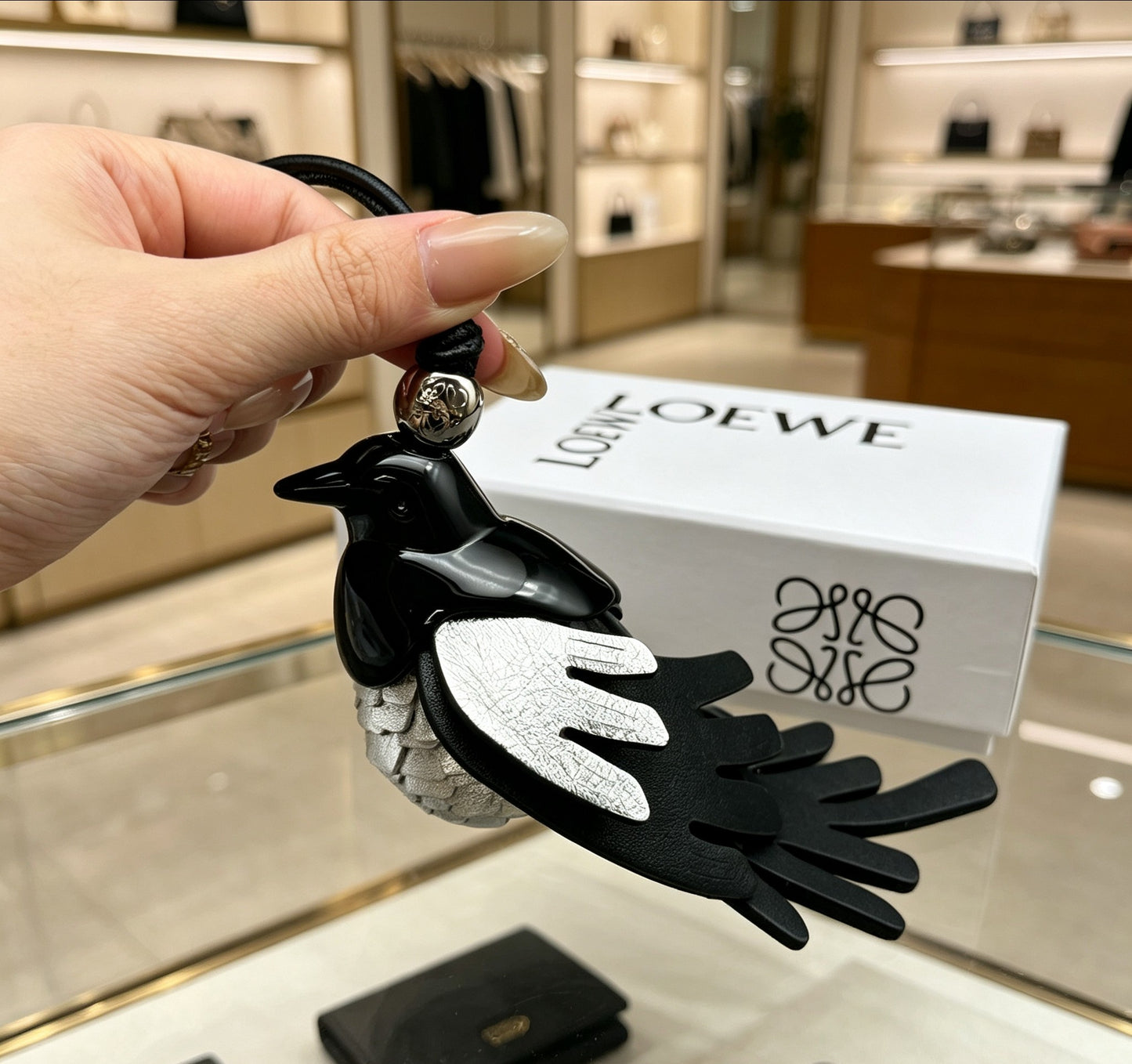 Bird Motif Bag Charm in Silver-Tone with Leather Detail detail view