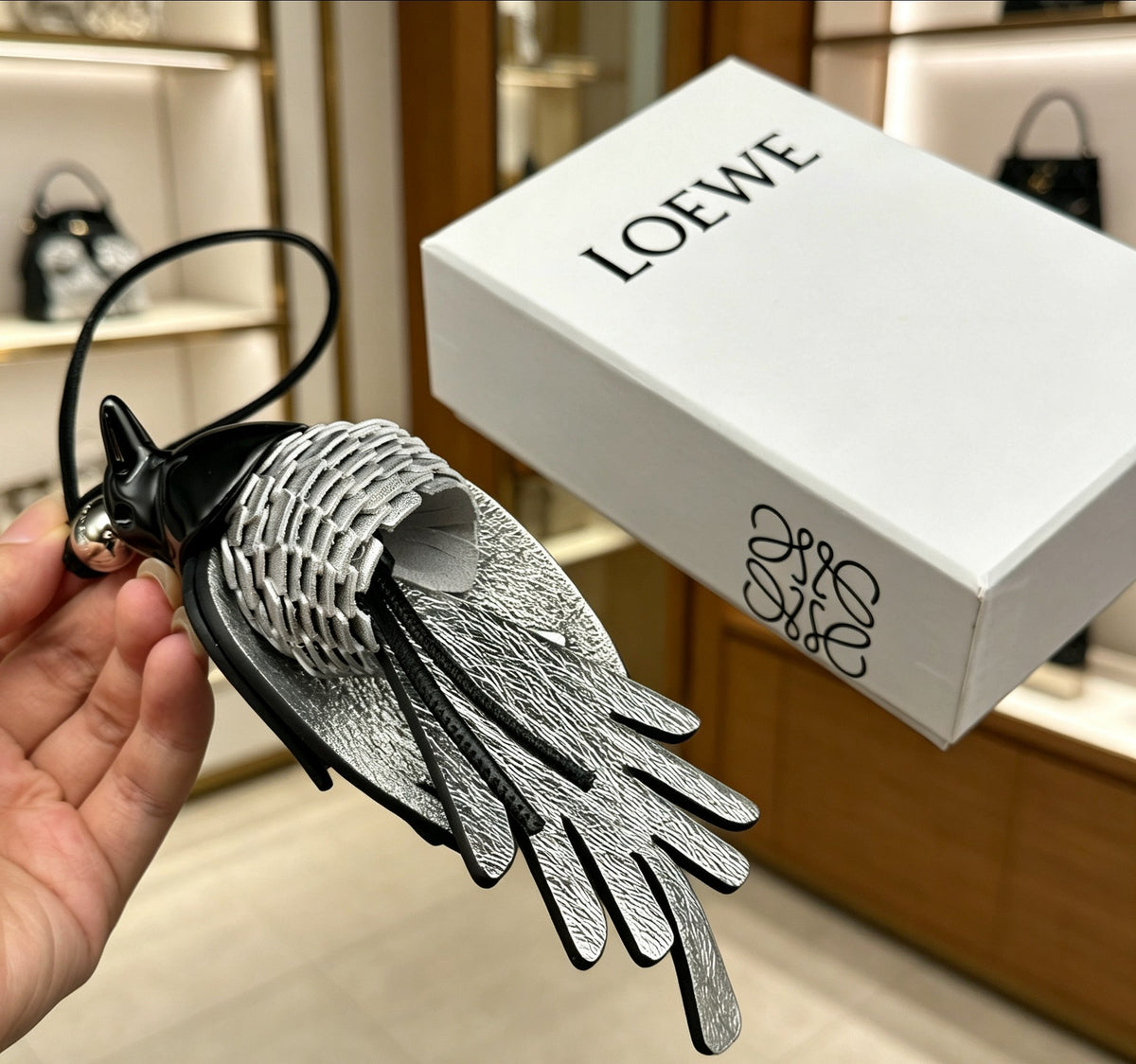 Bird Motif Bag Charm in Silver-Tone with Leather Detail styled view