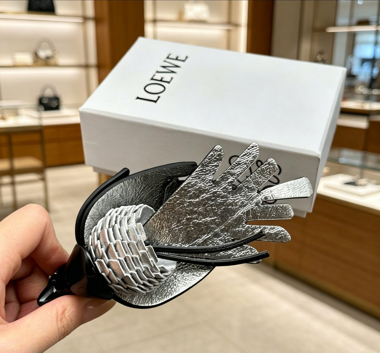 Bird Motif Bag Charm in Silver-Tone with Leather Detail close-up detail