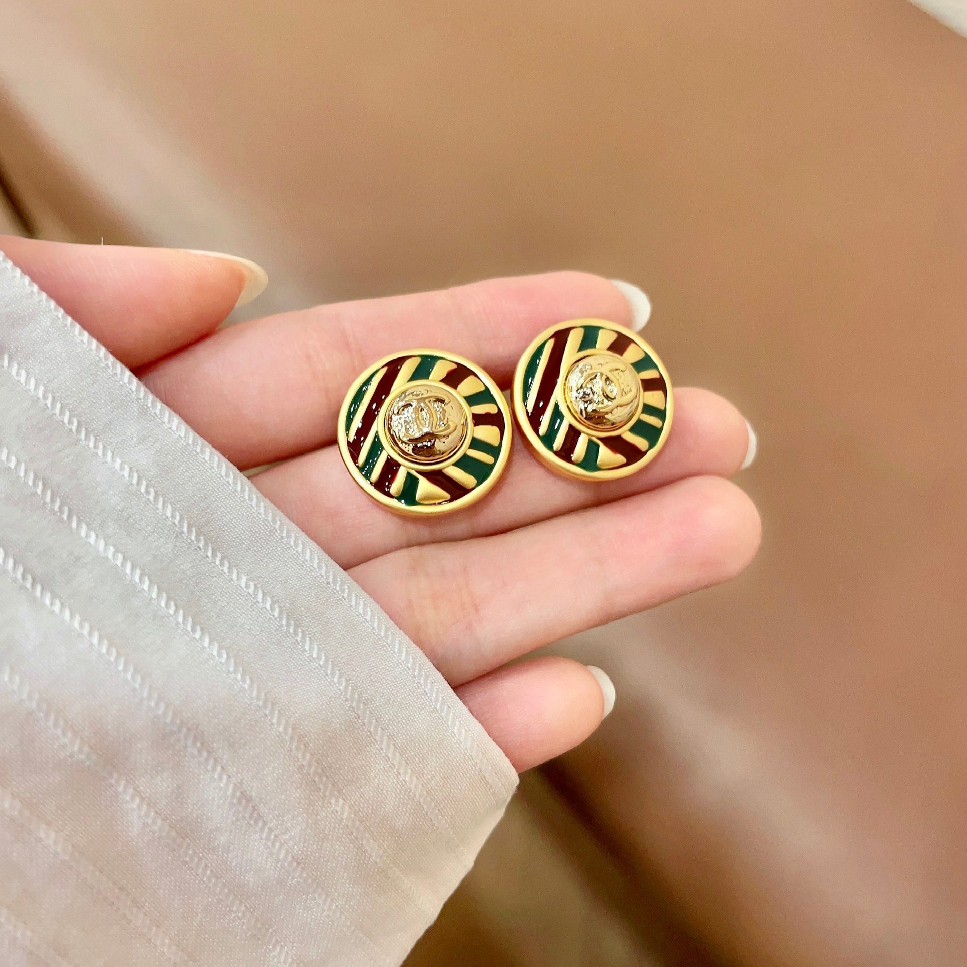 Signature Emblem Stud Earrings in Polished Metal-Tone – Design 105 side detail