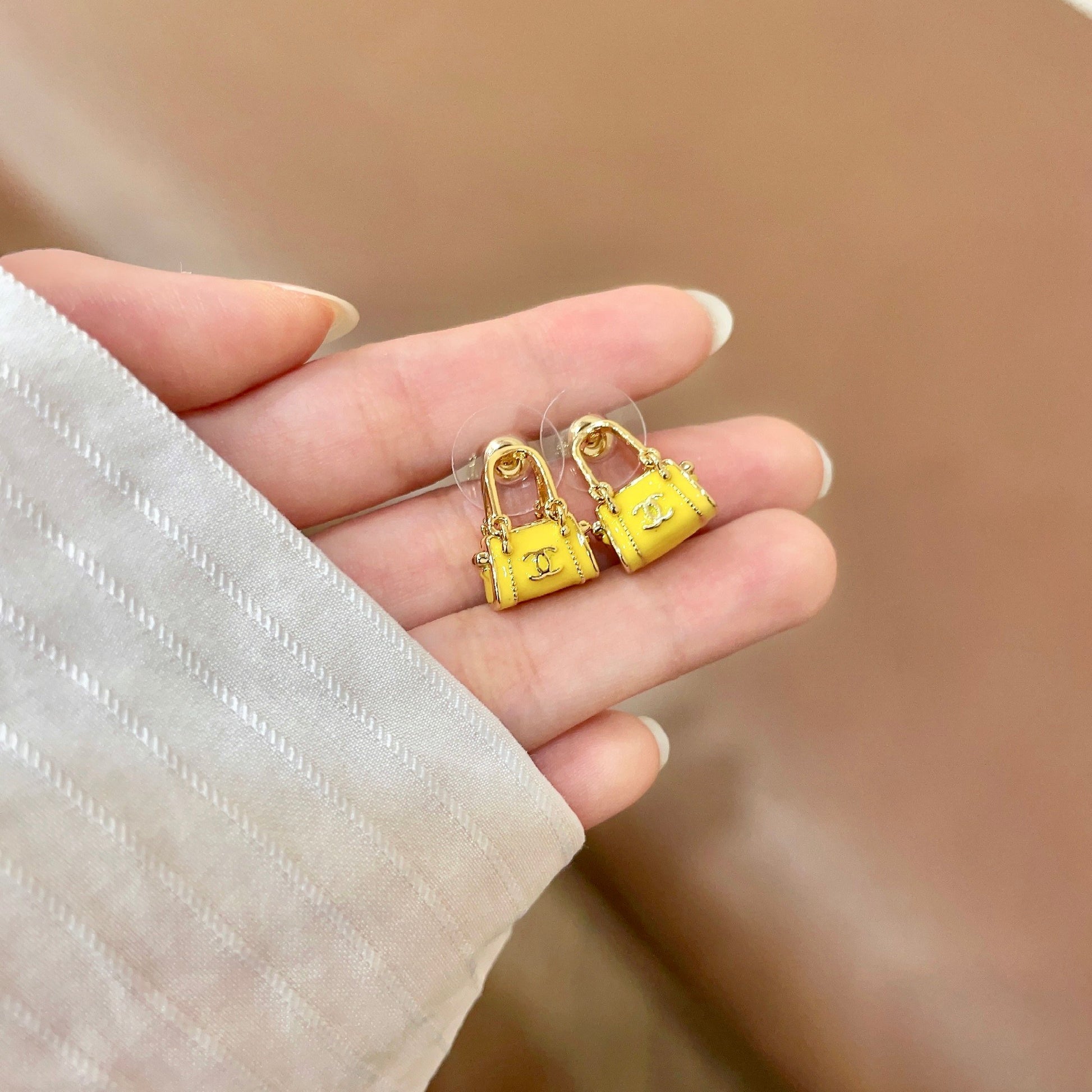 Signature Emblem Stud Earrings in Polished Metal-Tone – Design 102 side detail