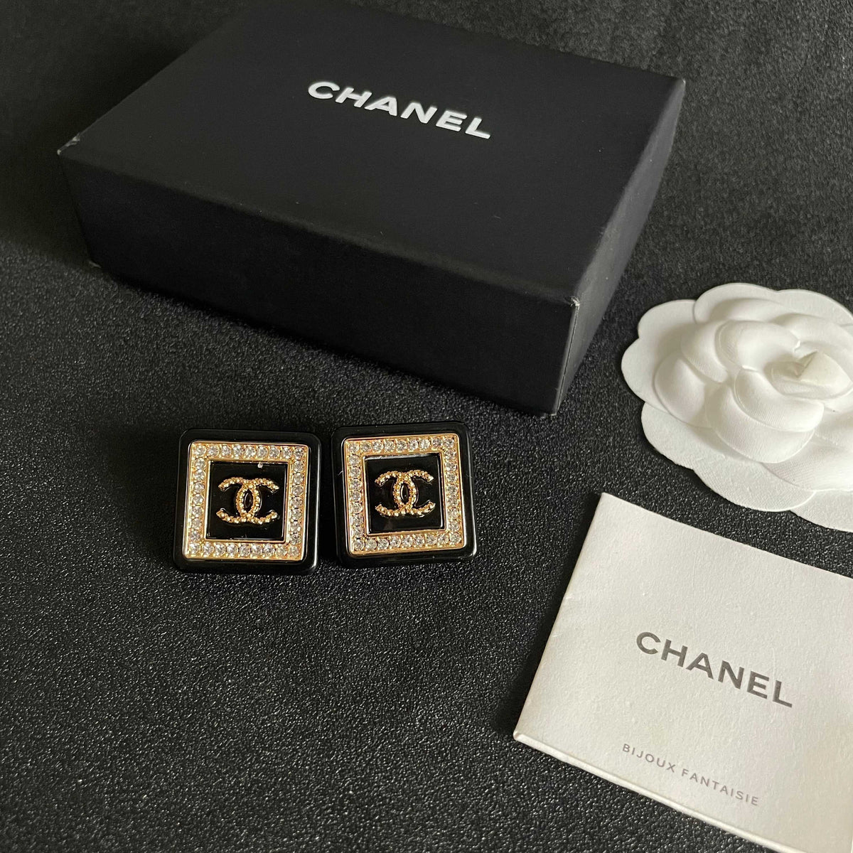 Double-C Emblem Stud Earrings in Polished Metal-Tone – Design 388 close-up detail