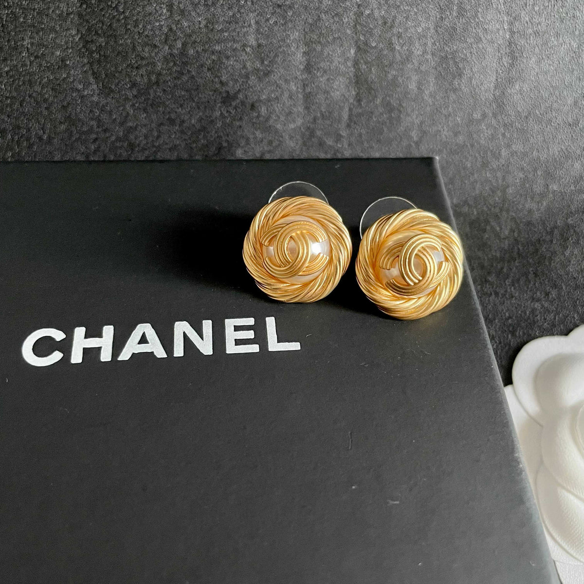 Double-C Emblem Stud Earrings in Polished Metal-Tone – Design 302 detail view