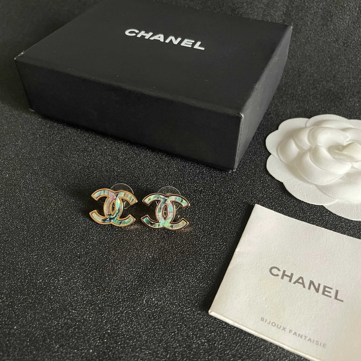 Double-C Emblem Stud Earrings in Polished Metal-Tone – Design 385 close-up detail