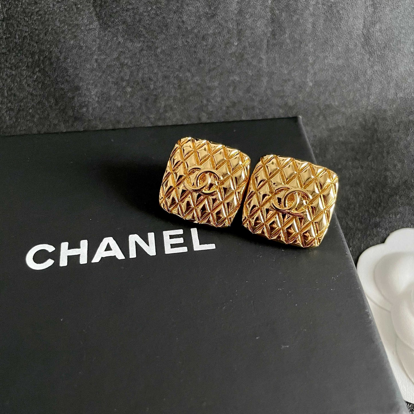 Double-C Emblem Stud Earrings in Polished Metal-Tone – Design 078 detail view