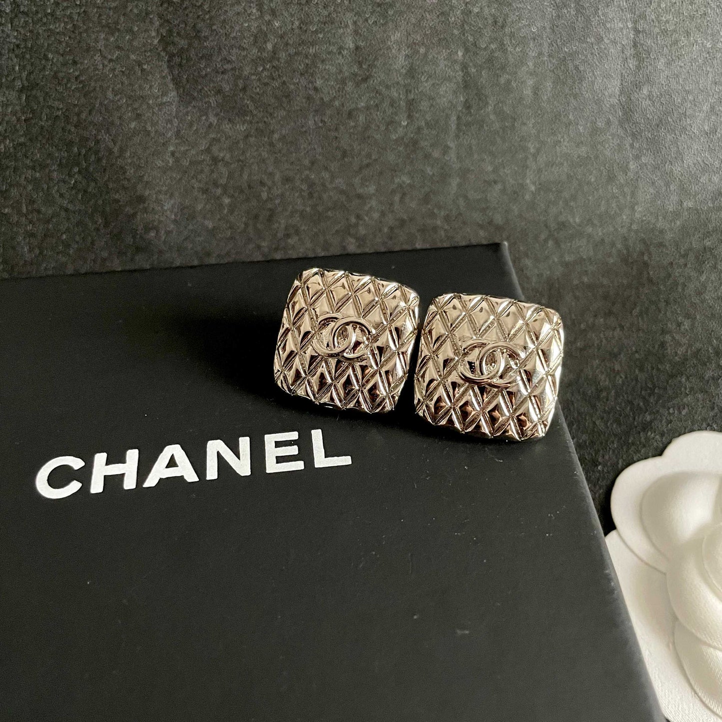 Double-C Emblem Stud Earrings in Polished Metal-Tone – Design 077 detail view