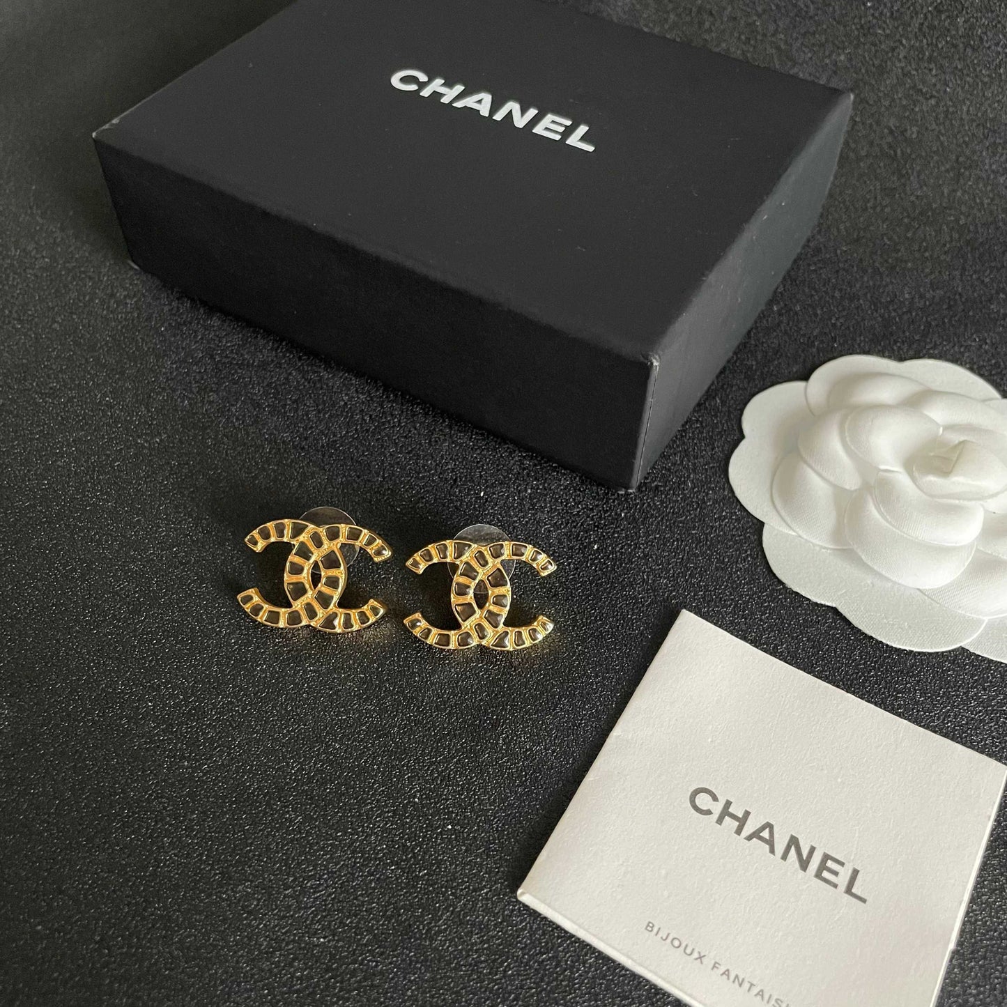 Double-C Emblem Stud Earrings in Polished Metal-Tone – Design 076 close-up detail