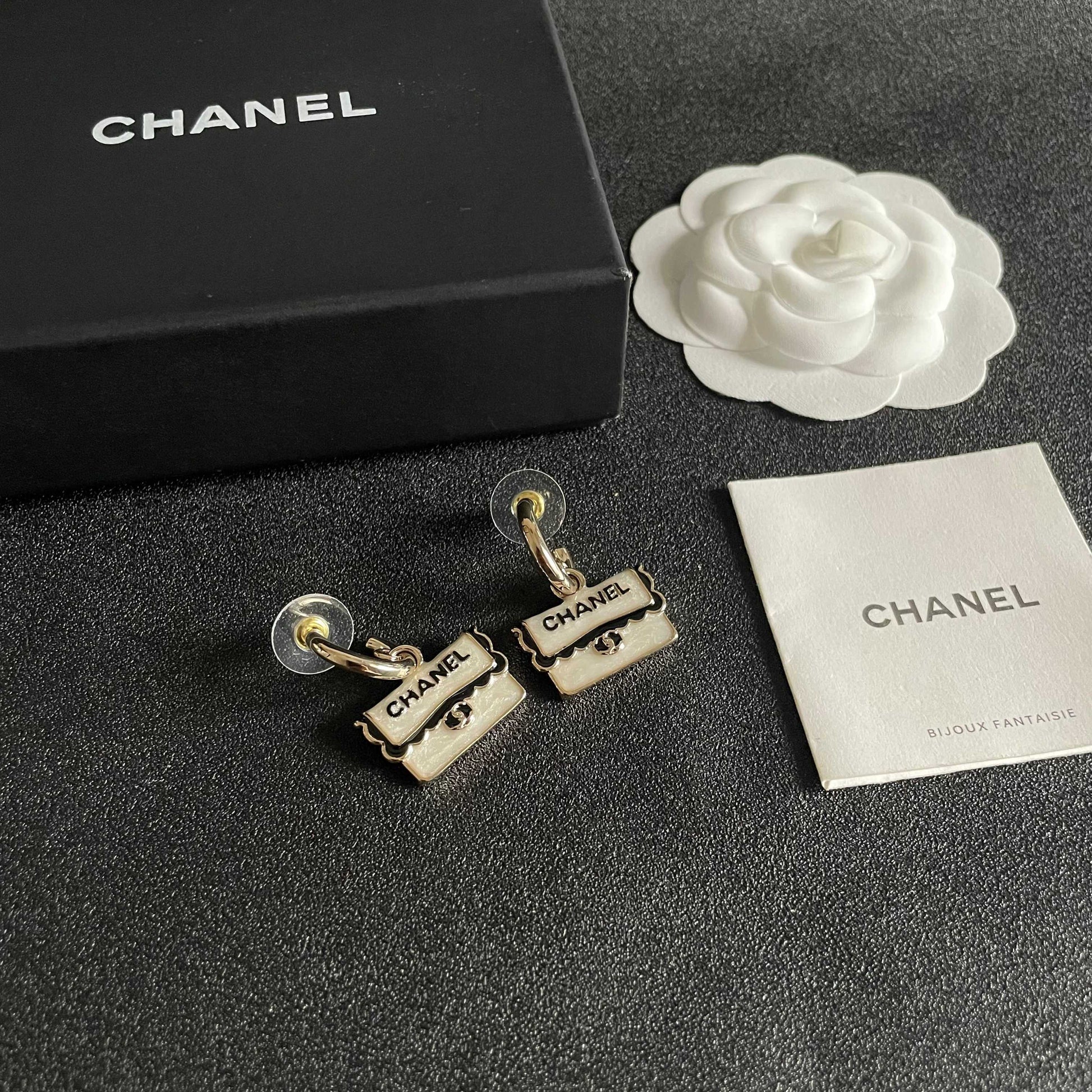Double-C Emblem Stud Earrings in Polished Metal-Tone – Design 445 styled product view