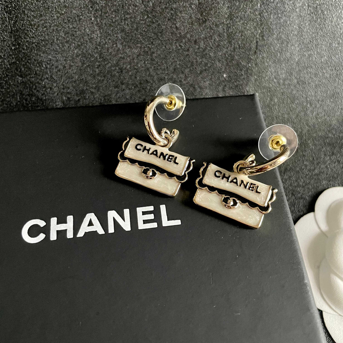 Double-C Emblem Stud Earrings in Polished Metal-Tone – Design 445 detail view
