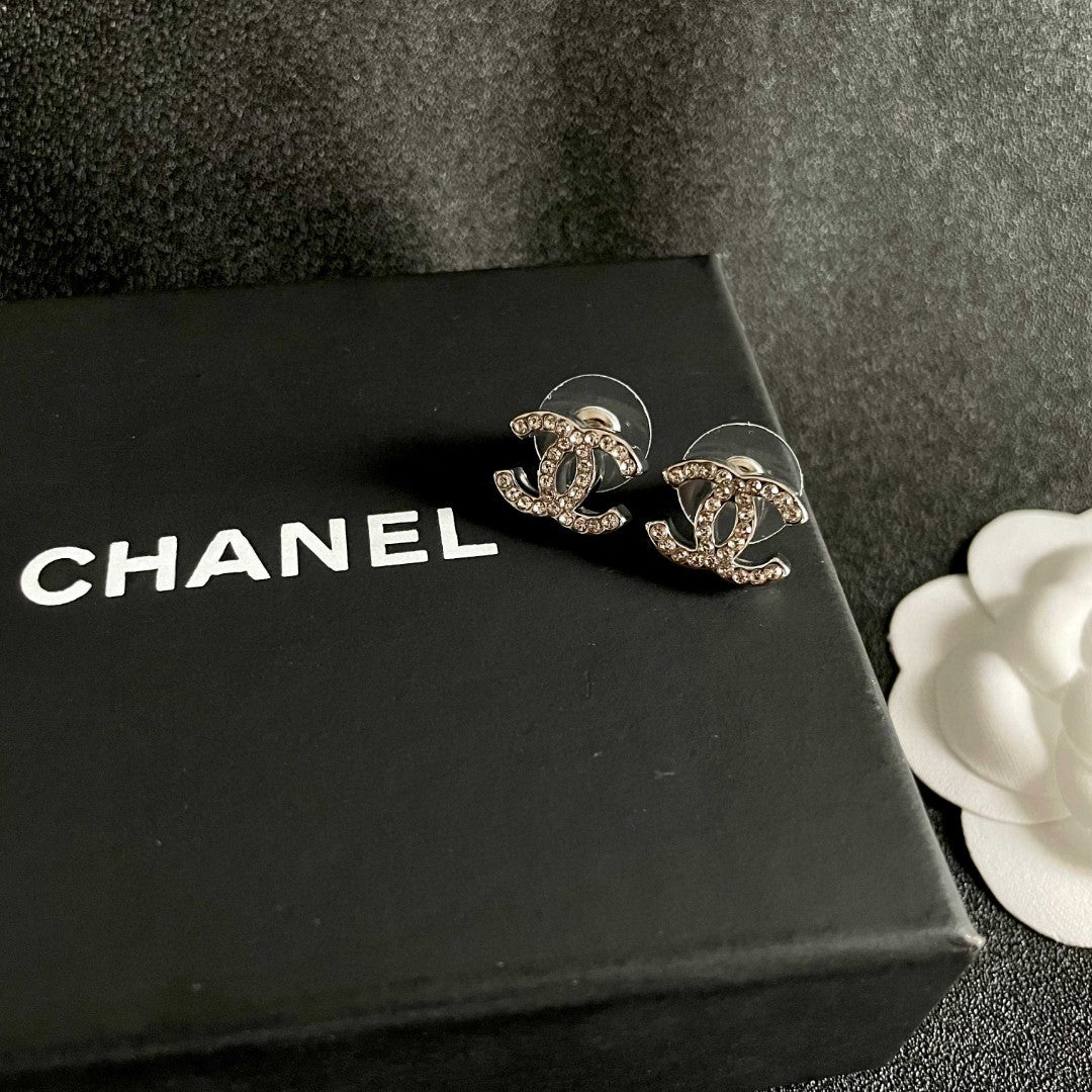 Double-C Emblem Stud Earrings in Polished Metal-Tone – Design 441 detail view