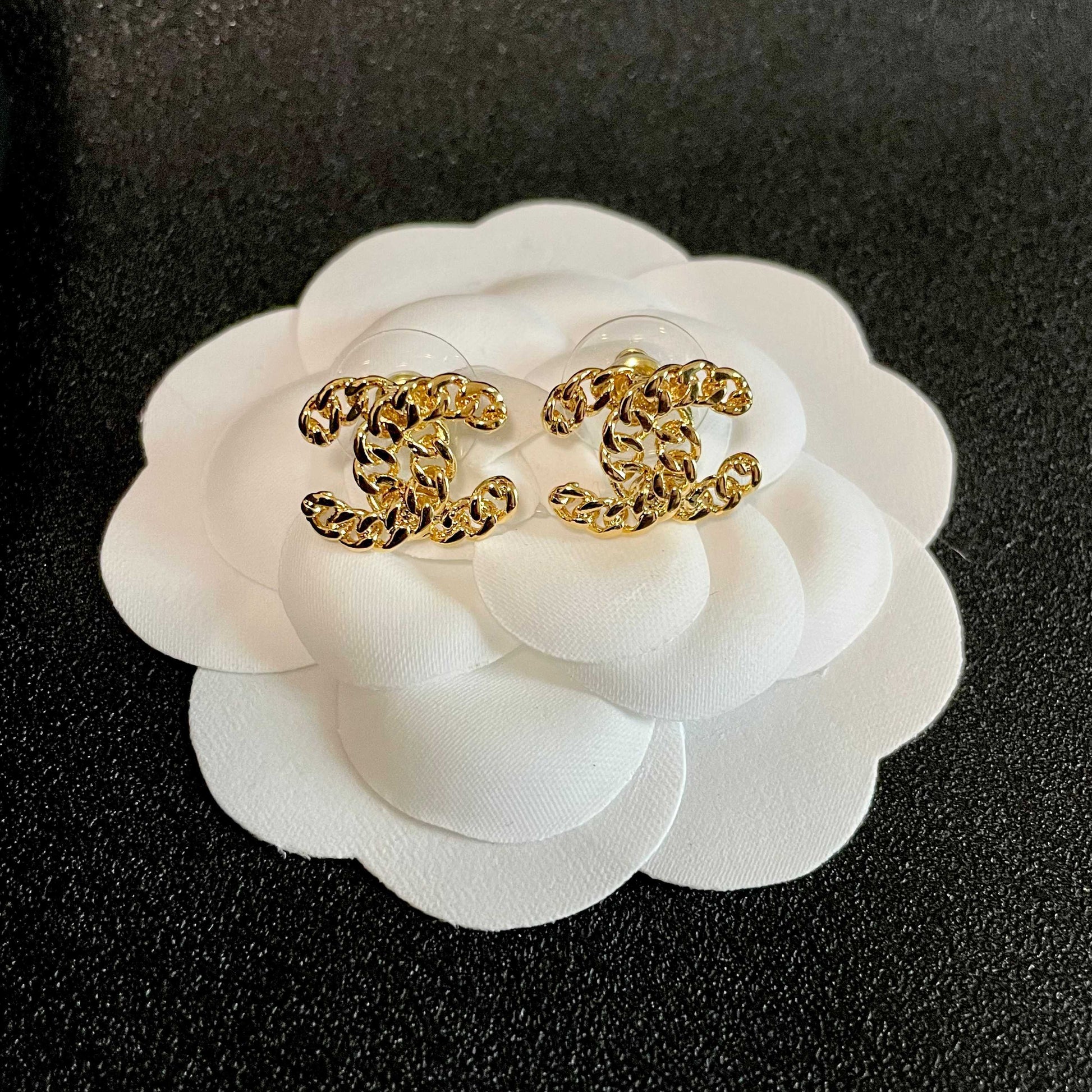Double-C Emblem Stud Earrings in Polished Metal-Tone – Design 440 front product view
