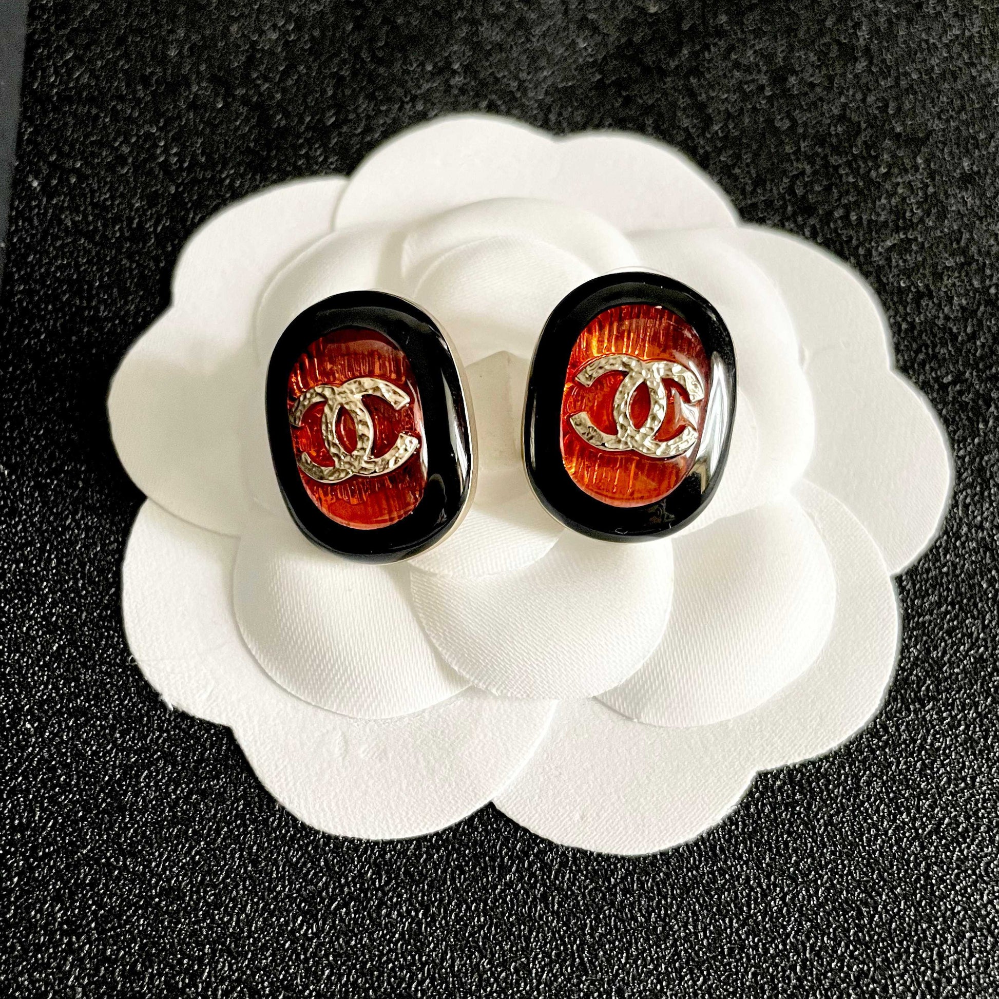 Double-C Emblem Stud Earrings in Polished Metal-Tone – Design 418 front product view