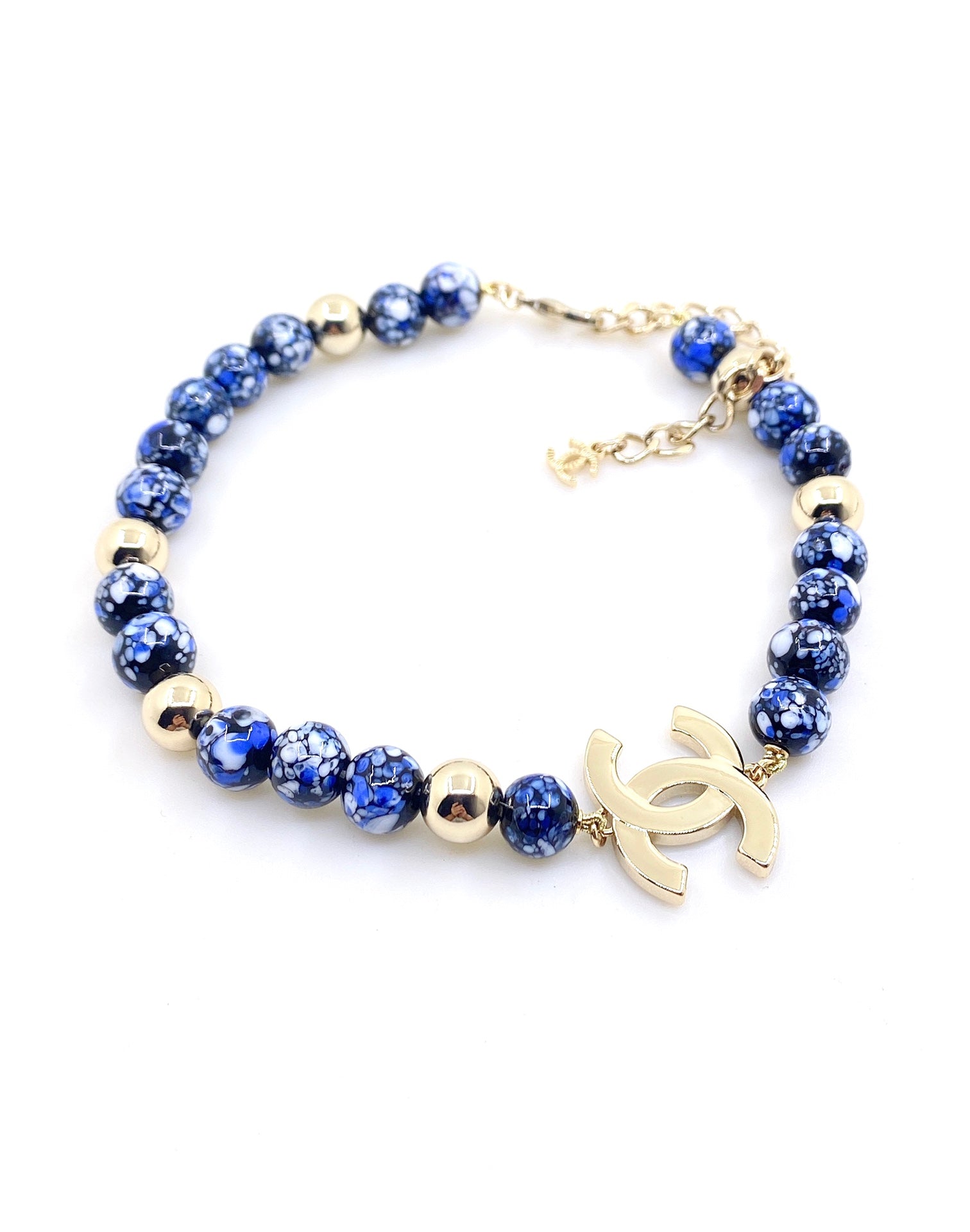 Signature Emblem Pendant Necklace in Gold-Tone – Blue Detail main product view