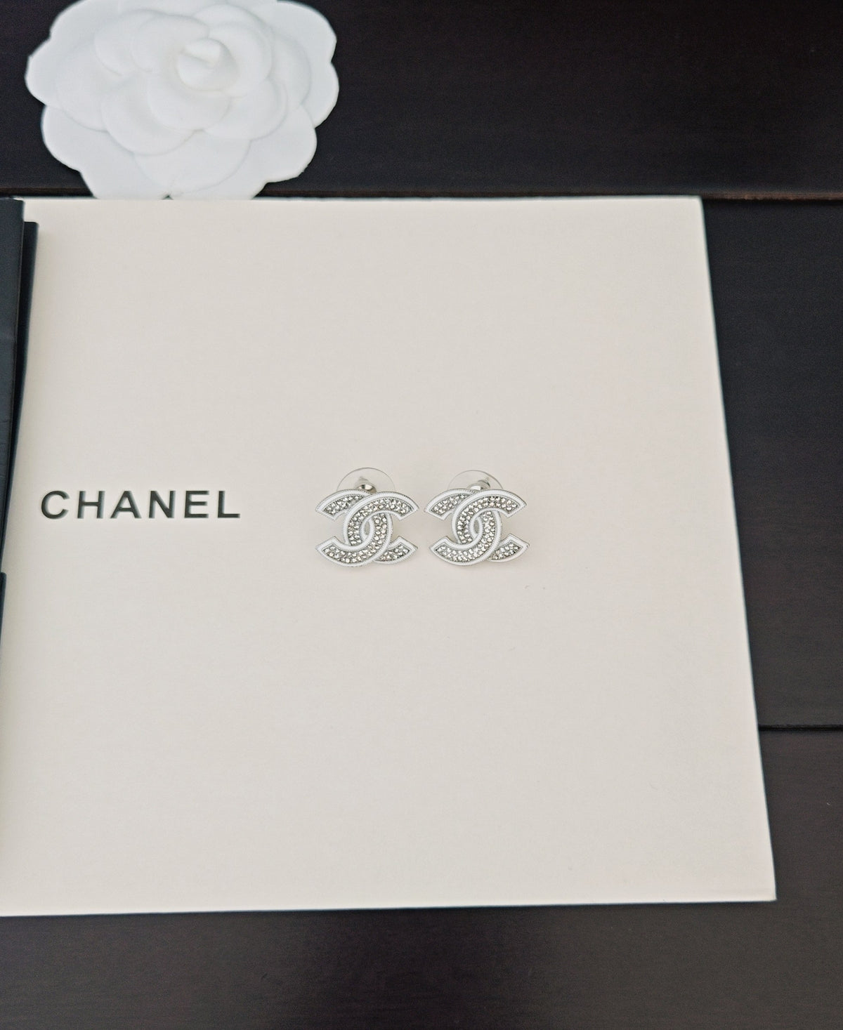 Signature Emblem Crystal-Accent Stud Earrings – White Detail – Design 002 detail view