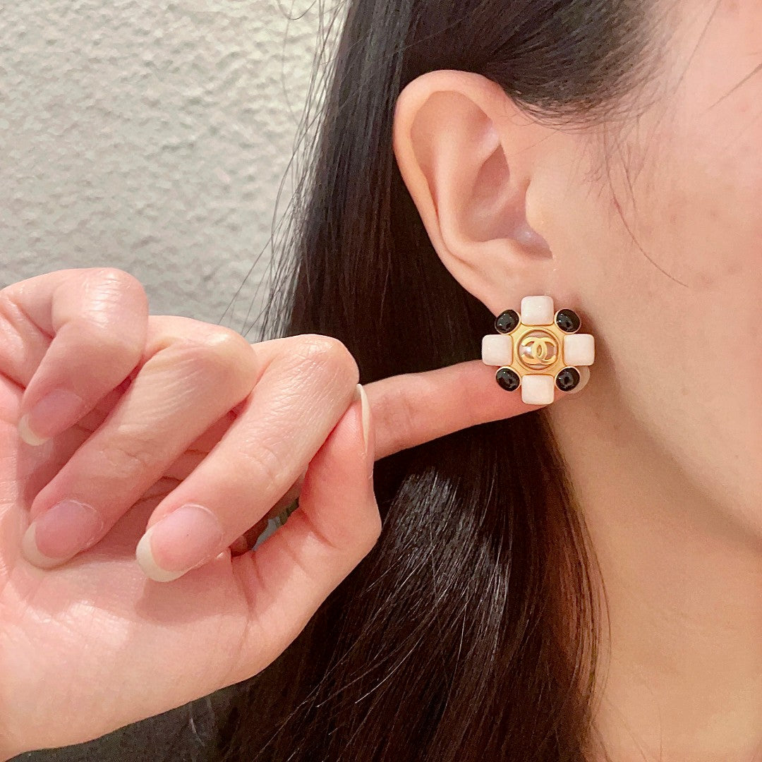Double-C Emblem Stud Earrings in Polished Metal-Tone – Design 471 front product view
