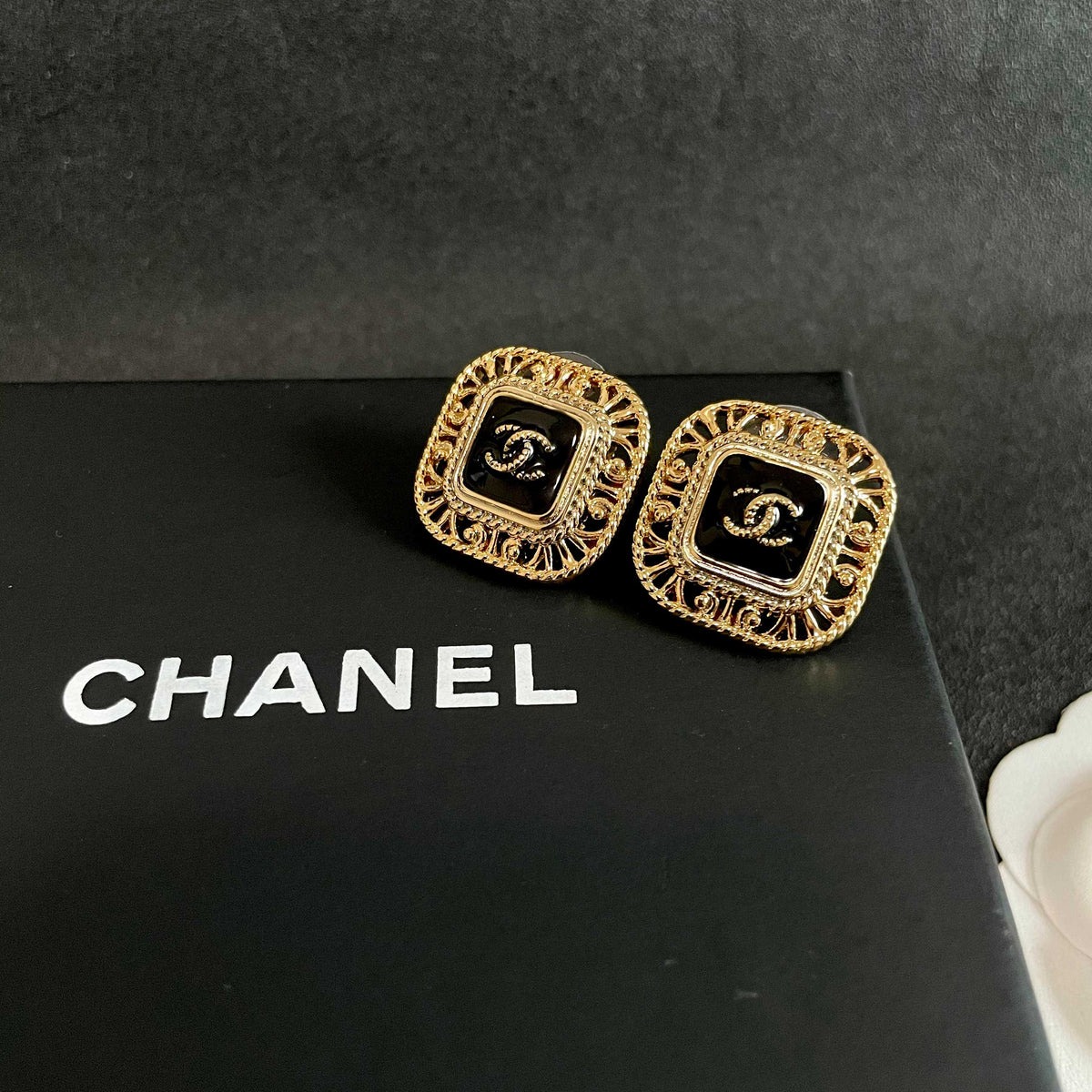 Double-C Emblem Stud Earrings in Polished Metal-Tone – Design 140 detail view